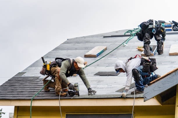 Professional Roof Installation technician working in Grafton, MA